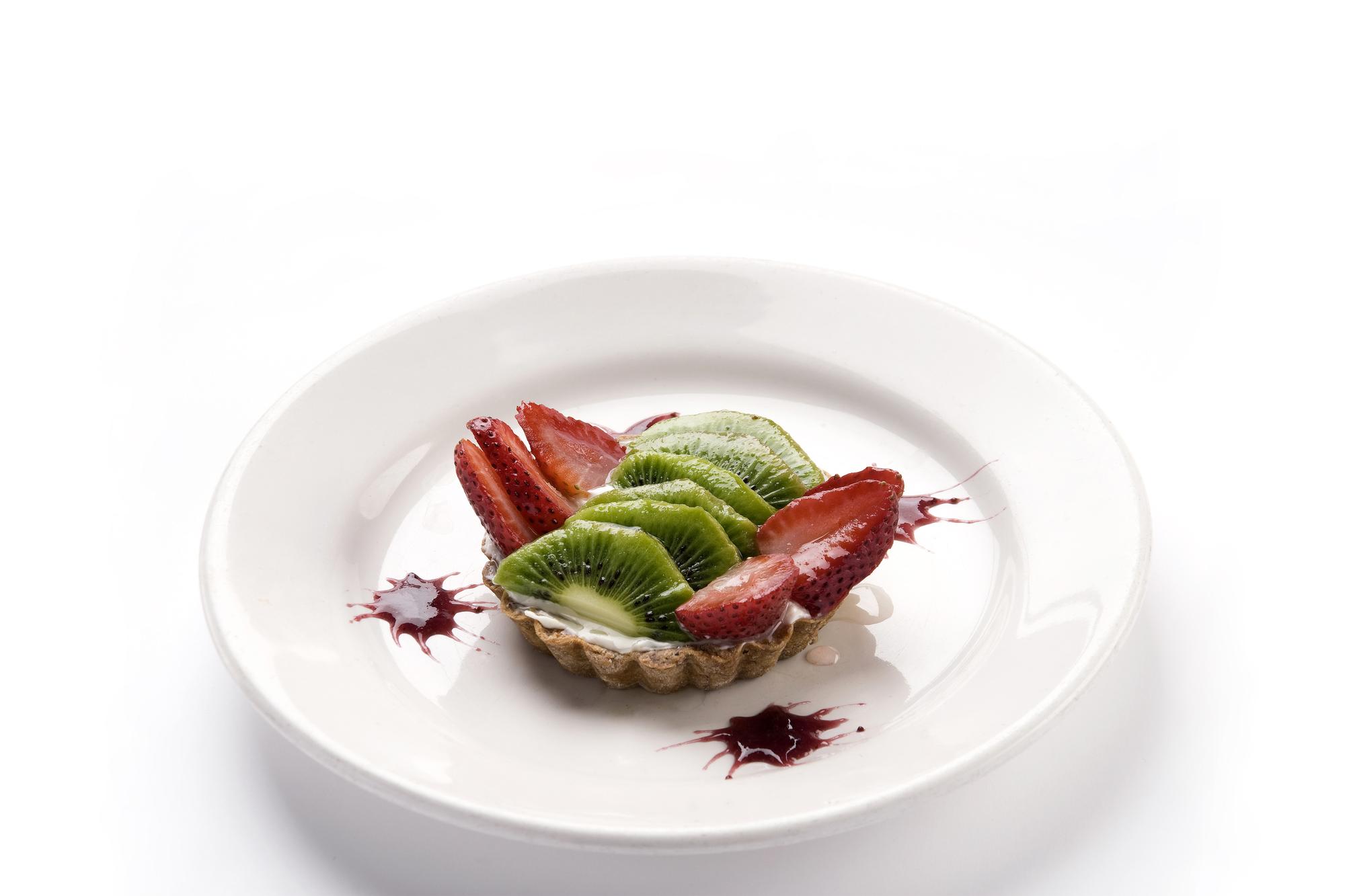 Assorted plated gourmet dishes on marble